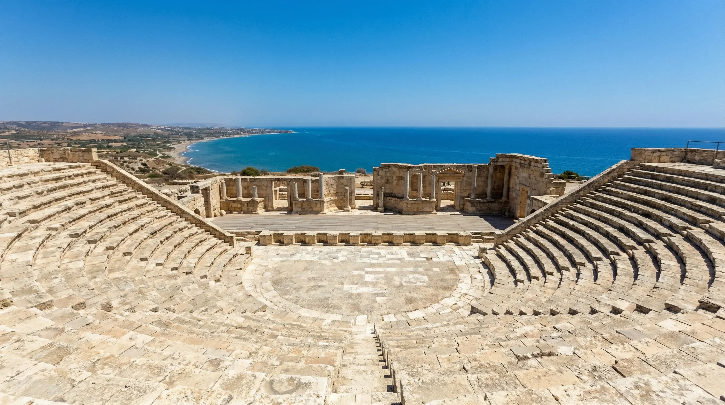 The ancient stone amphitheater of Kourion situated on a cliffside with a backdrop of the Mediterranean Sea near Limassol.