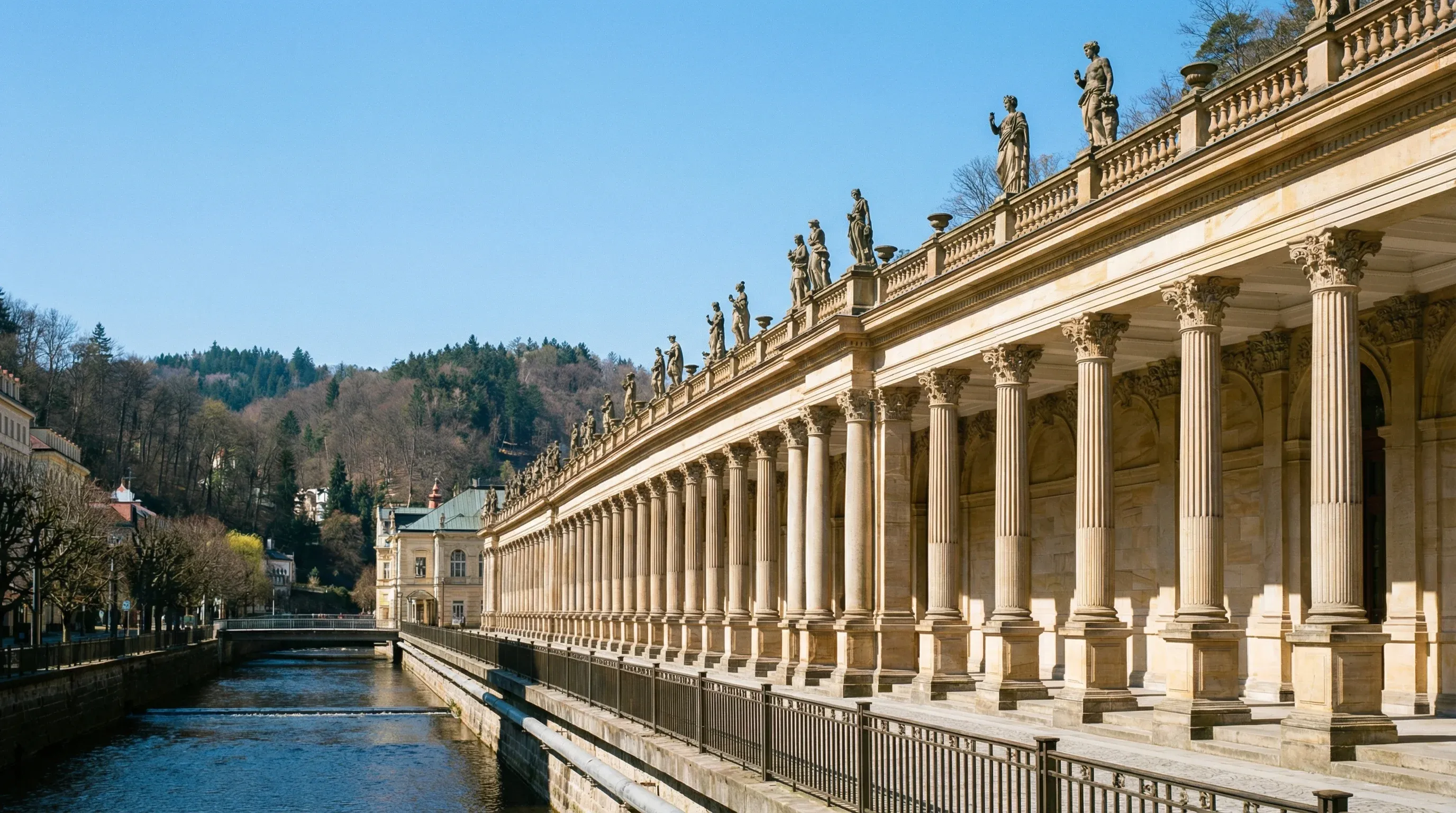 The long Neo-Renaissance Mill Colonnade with its many stone columns and statues in the spa town of Karlovy Vary.