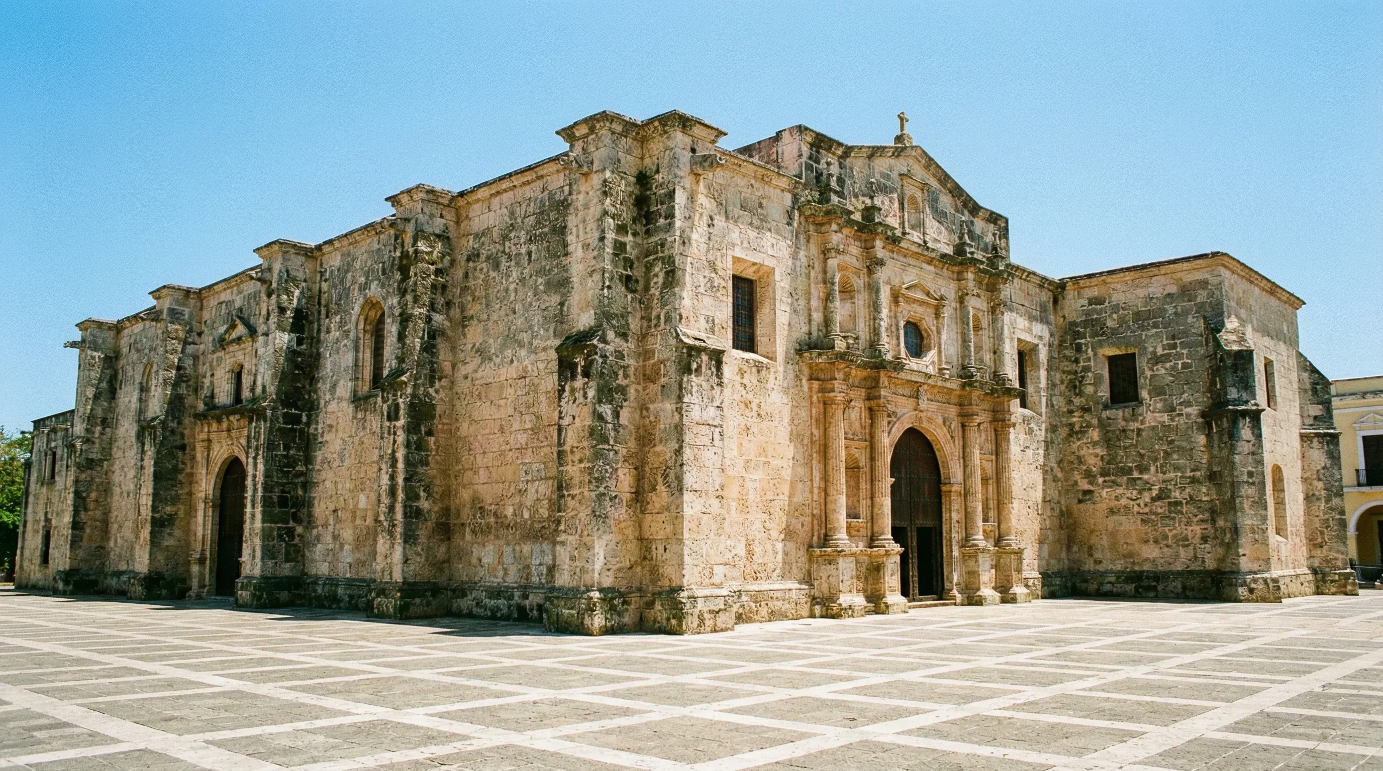 The limestone facade of the Catedral Primada de América located in the Colonial Zone of Santo Domingo.