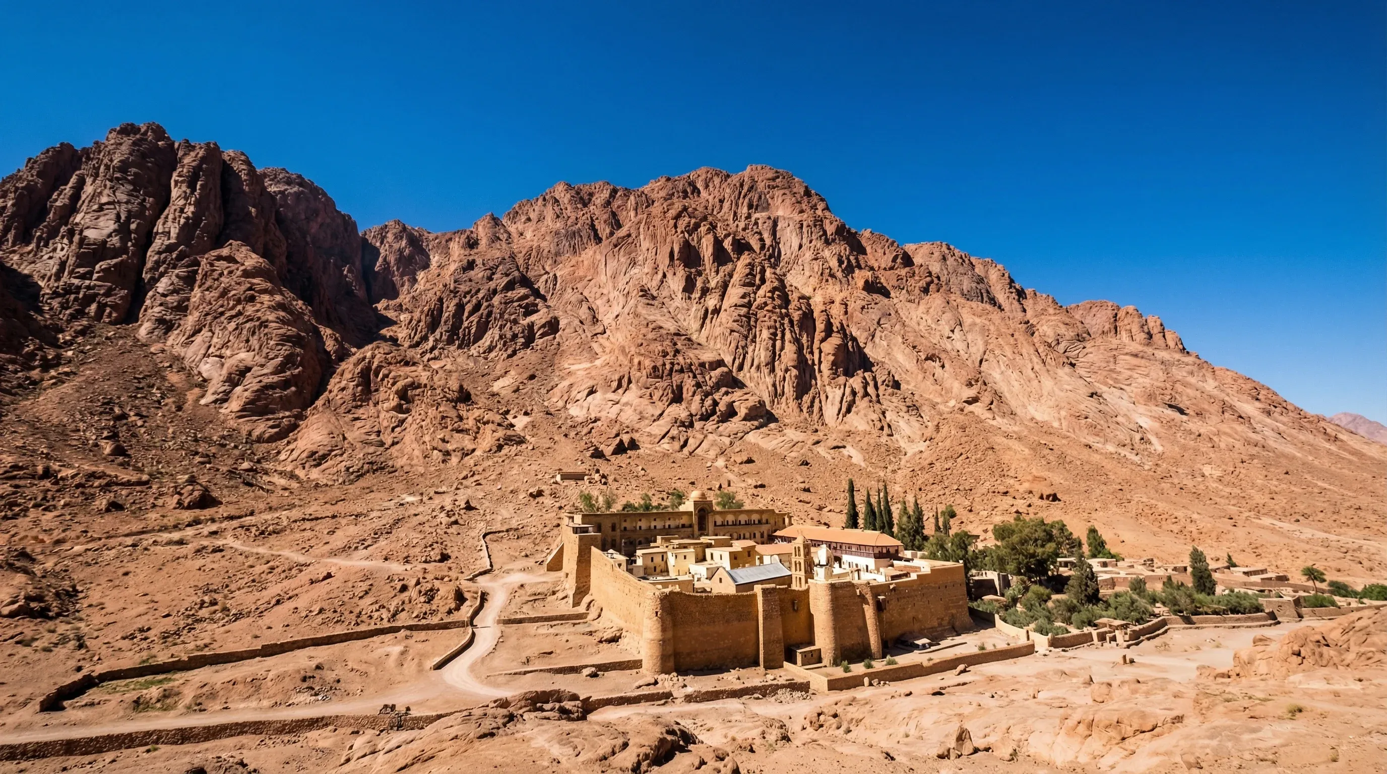 The fortified Saint Catherine's Monastery at the foot of the granite mountains in the Sinai Peninsula.