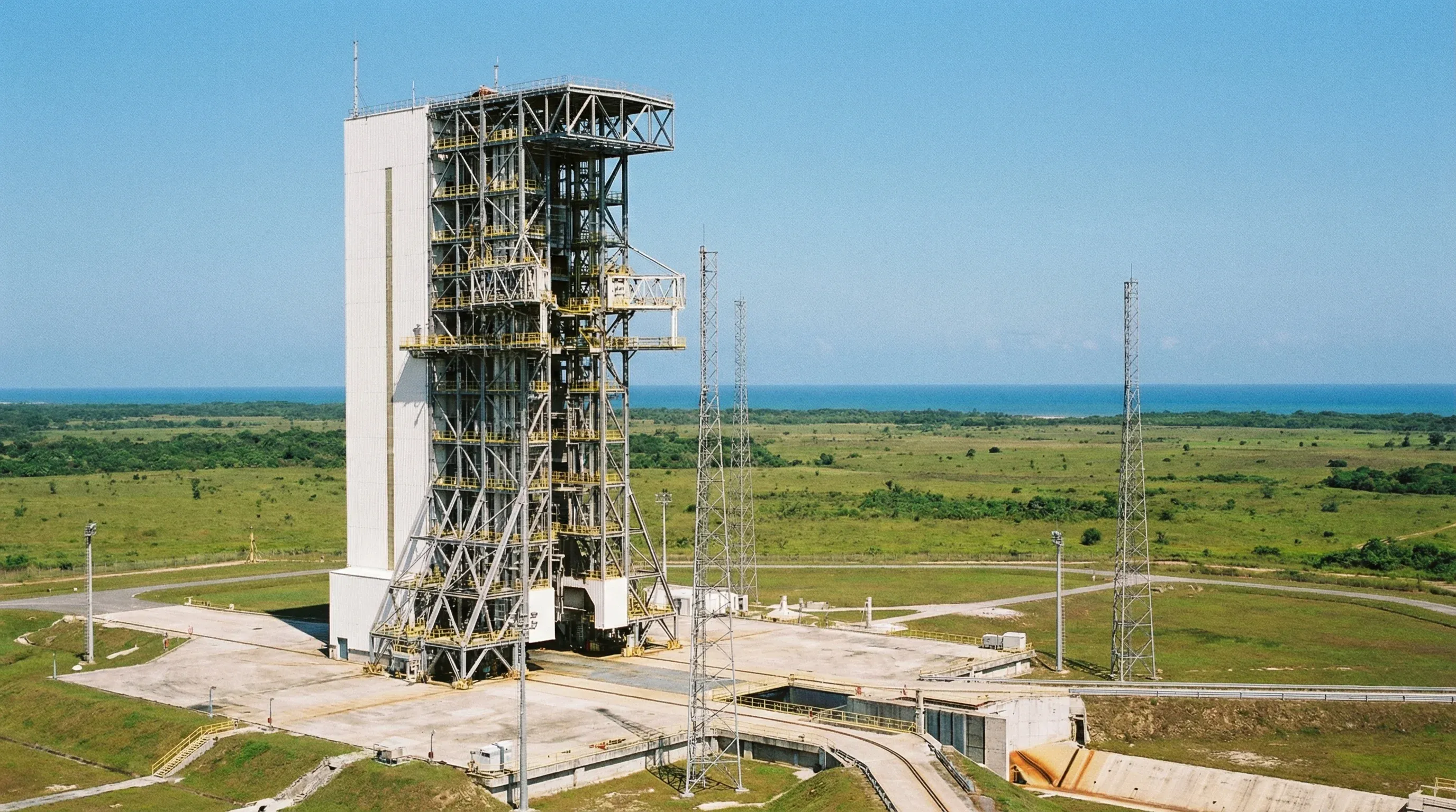The Ariane 6 launch complex at the Guiana Space Centre in Kourou, featuring the tall mobile gantry and launch pad.