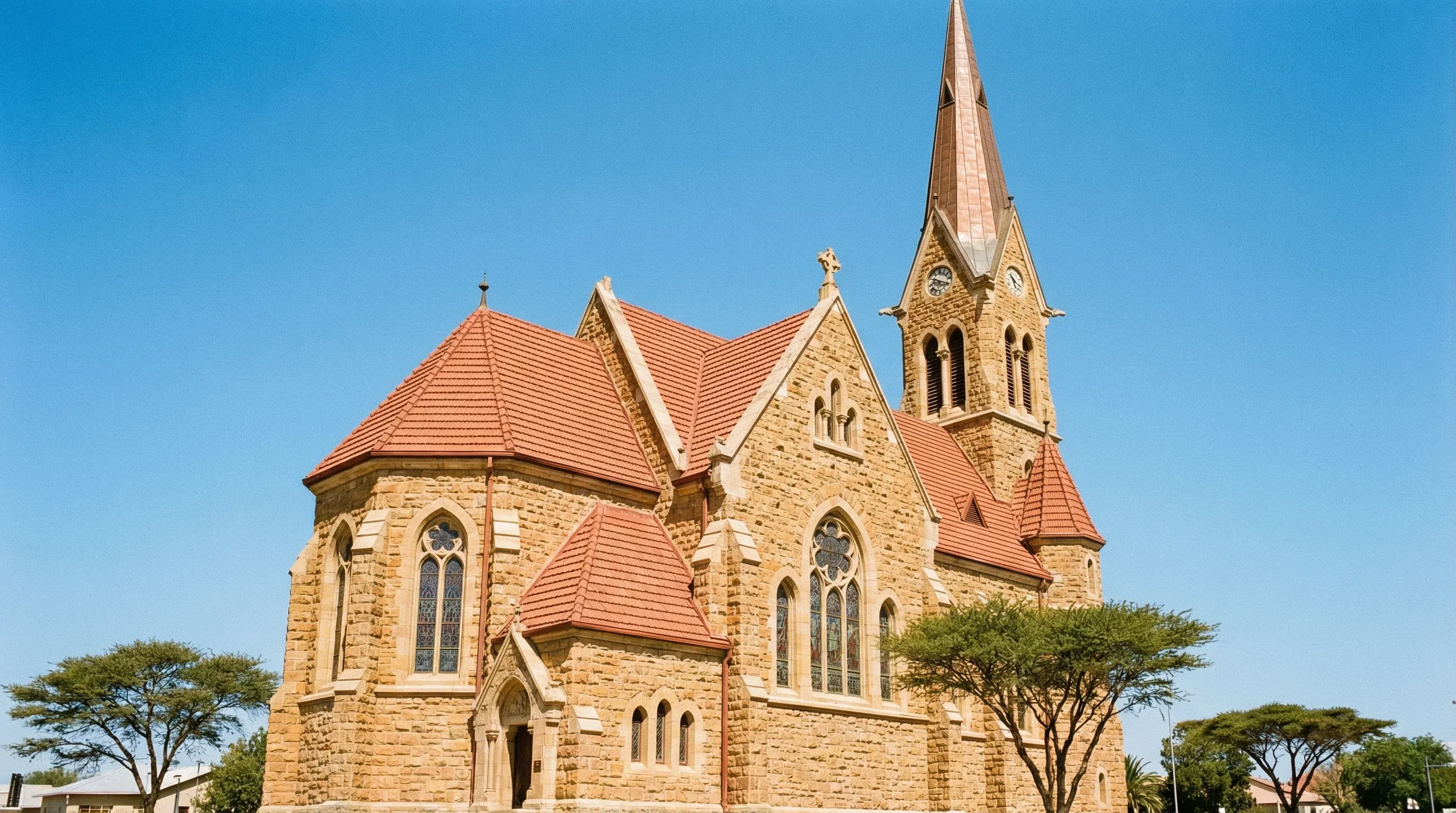 The historic sandstone Christuskirche with its distinctive spire and red roof in Windhoek.