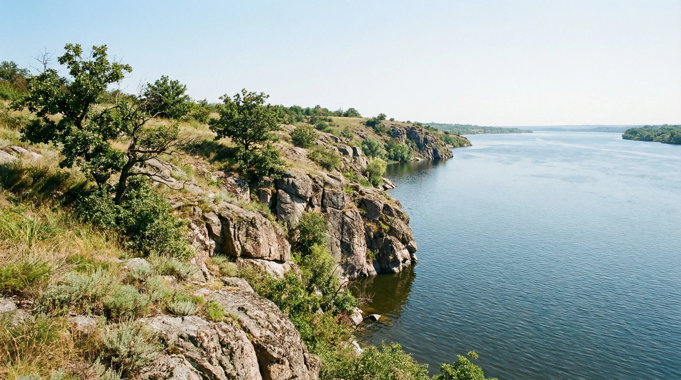 A wide view of the rocky cliffs on Khortytsia Island overlooking the Dnipro River in central Ukraine.