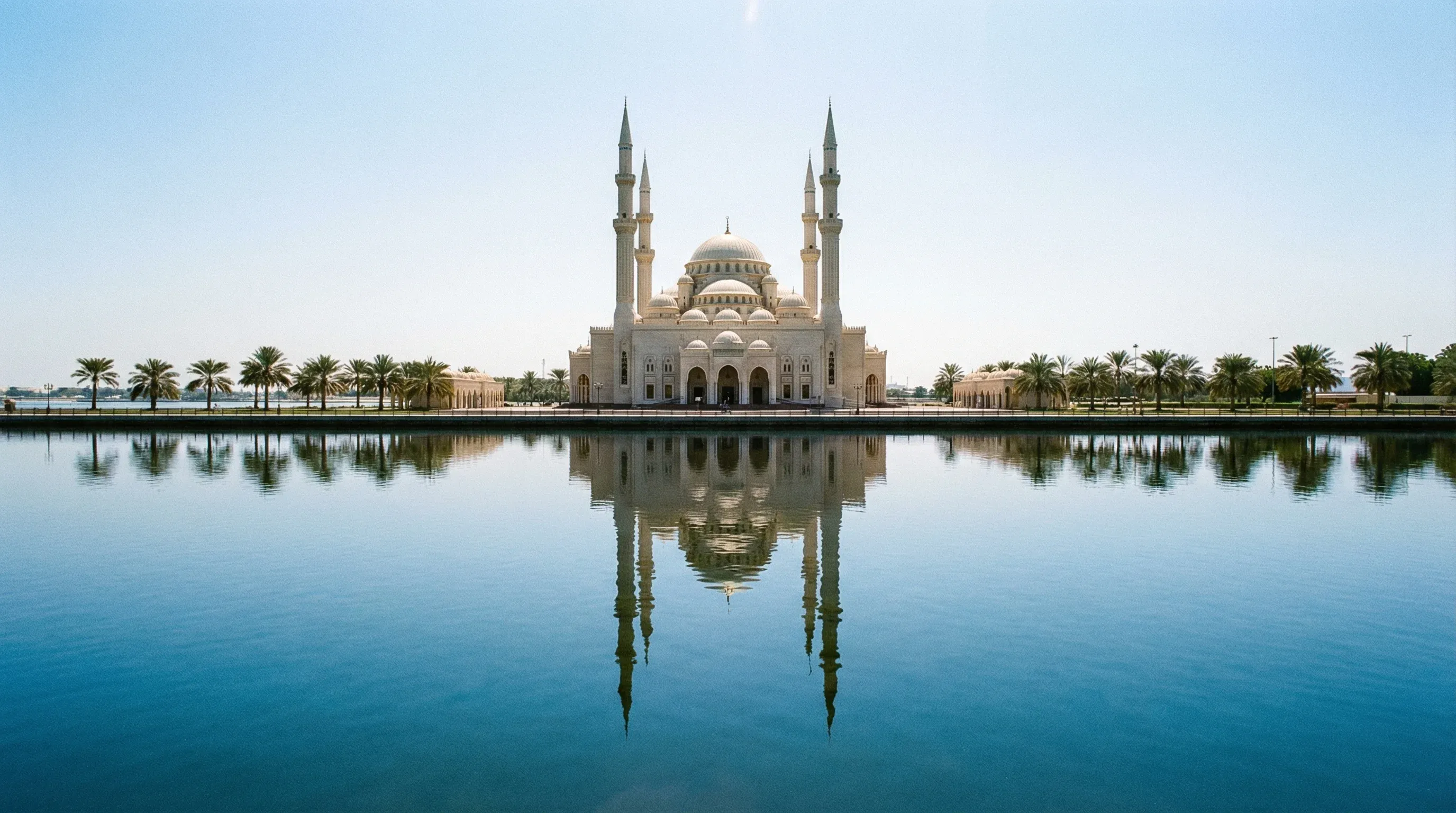 The Al Noor Mosque with its traditional domes and minarets on the edge of the Khalid Lagoon in Sharjah.