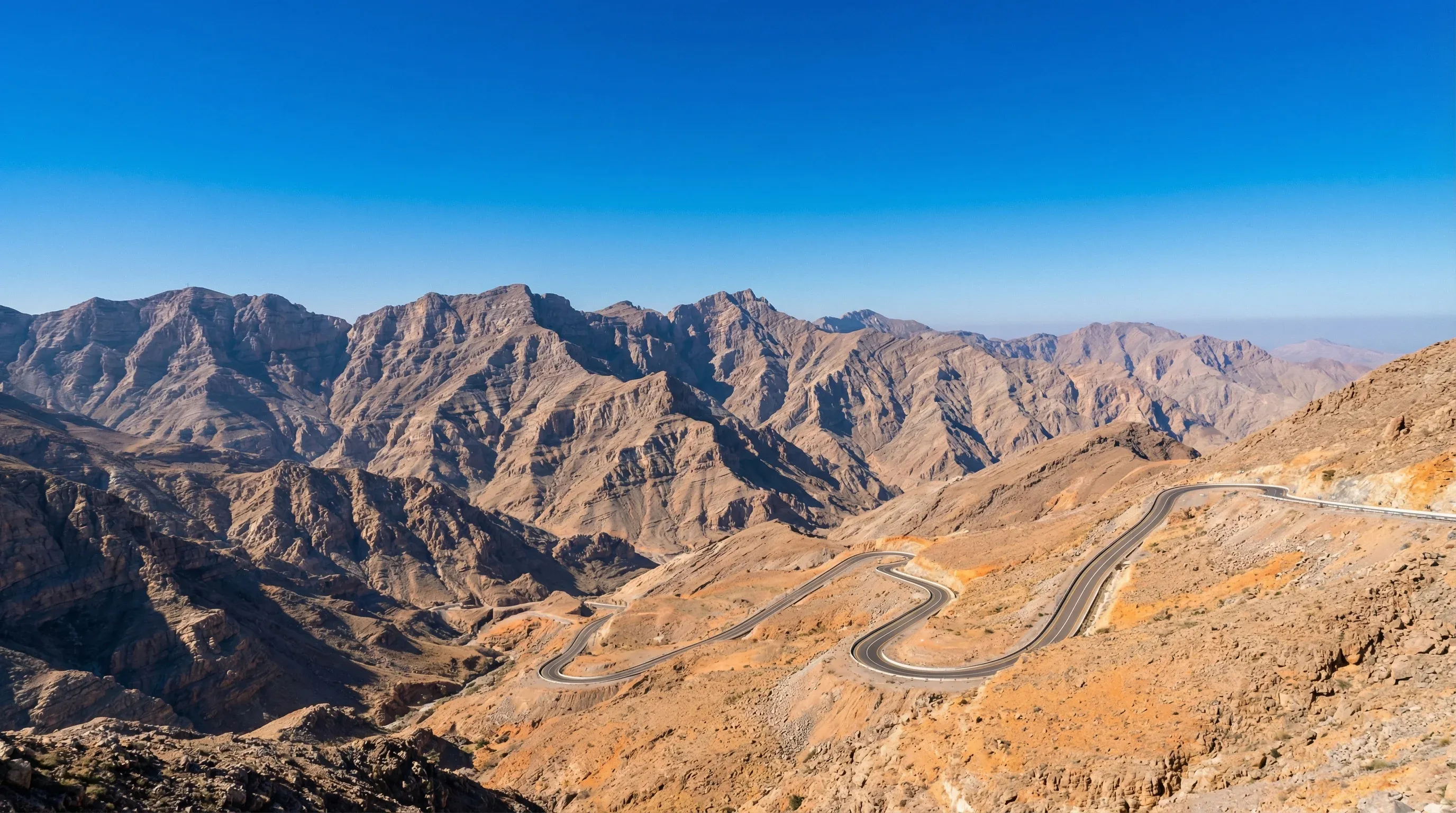 The rugged limestone peaks and desert valleys of Jebel Jais in the Hajar Mountains of Ras Al Khaimah.