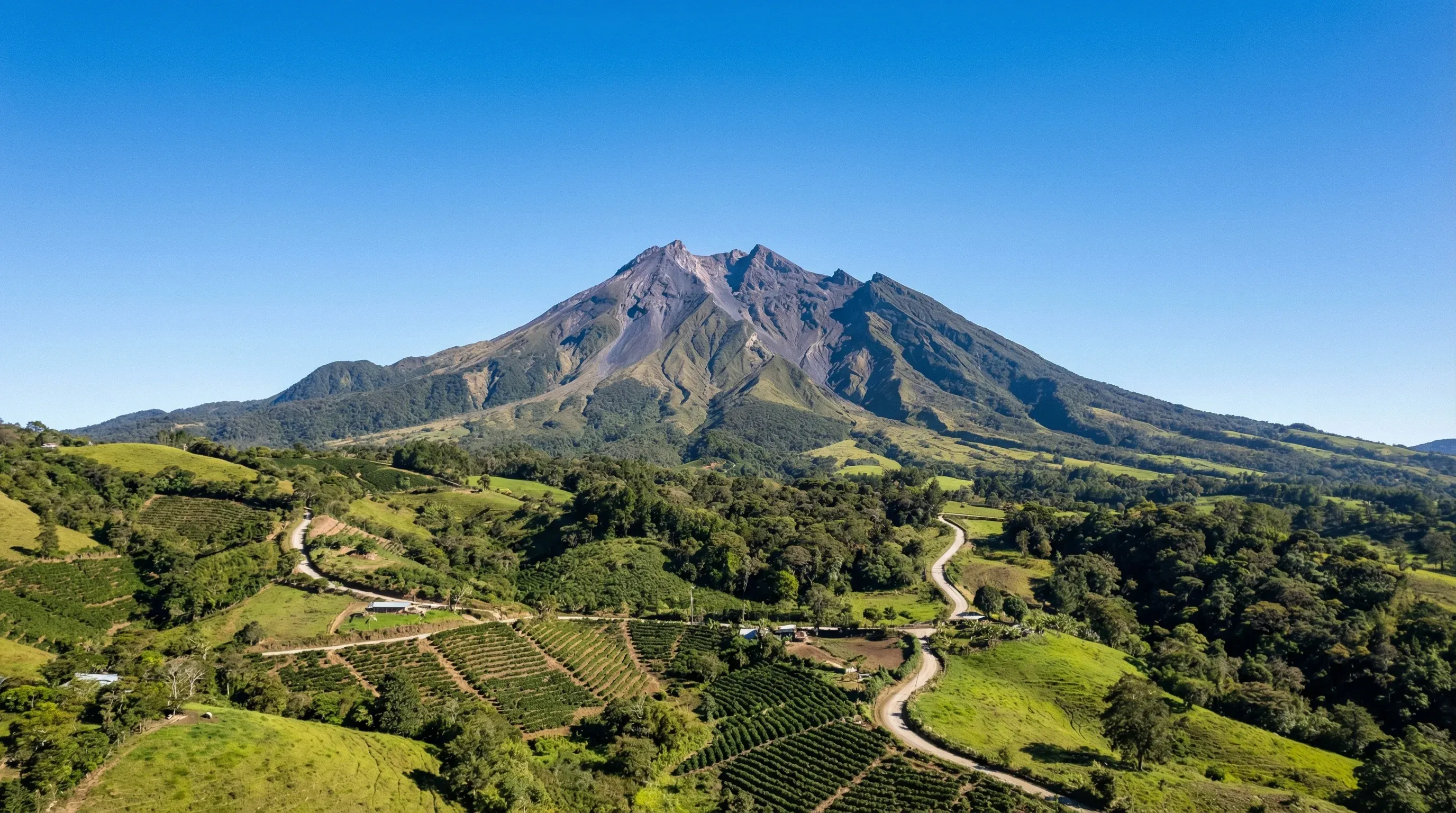 The volcanic peak of Volcán Barú rising above the green coffee plantations of the Boquete valley.