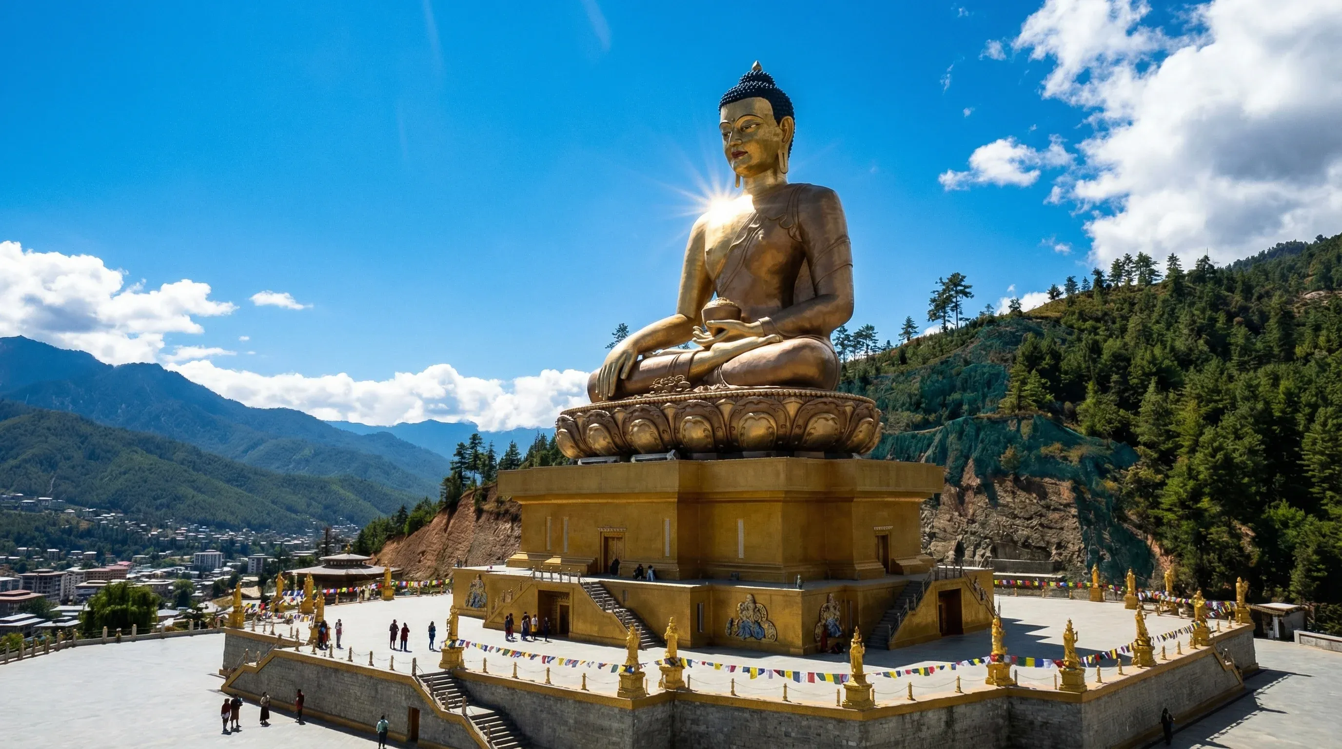 A large golden Buddha statue situated on a hill overlooking the Thimphu valley in Bhutan.