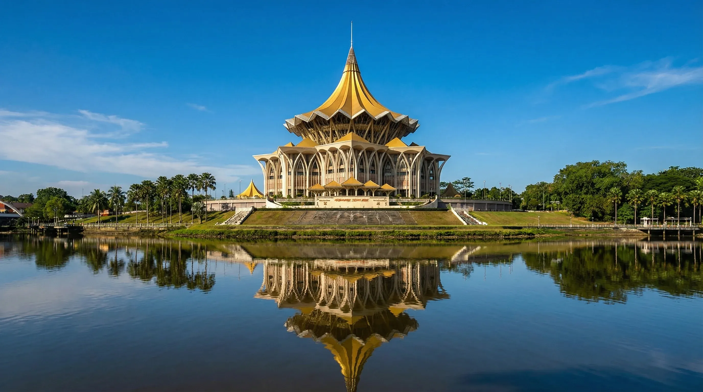 The golden-roofed Sarawak State Legislative Assembly Building on the edge of the Sarawak River in Kuching.